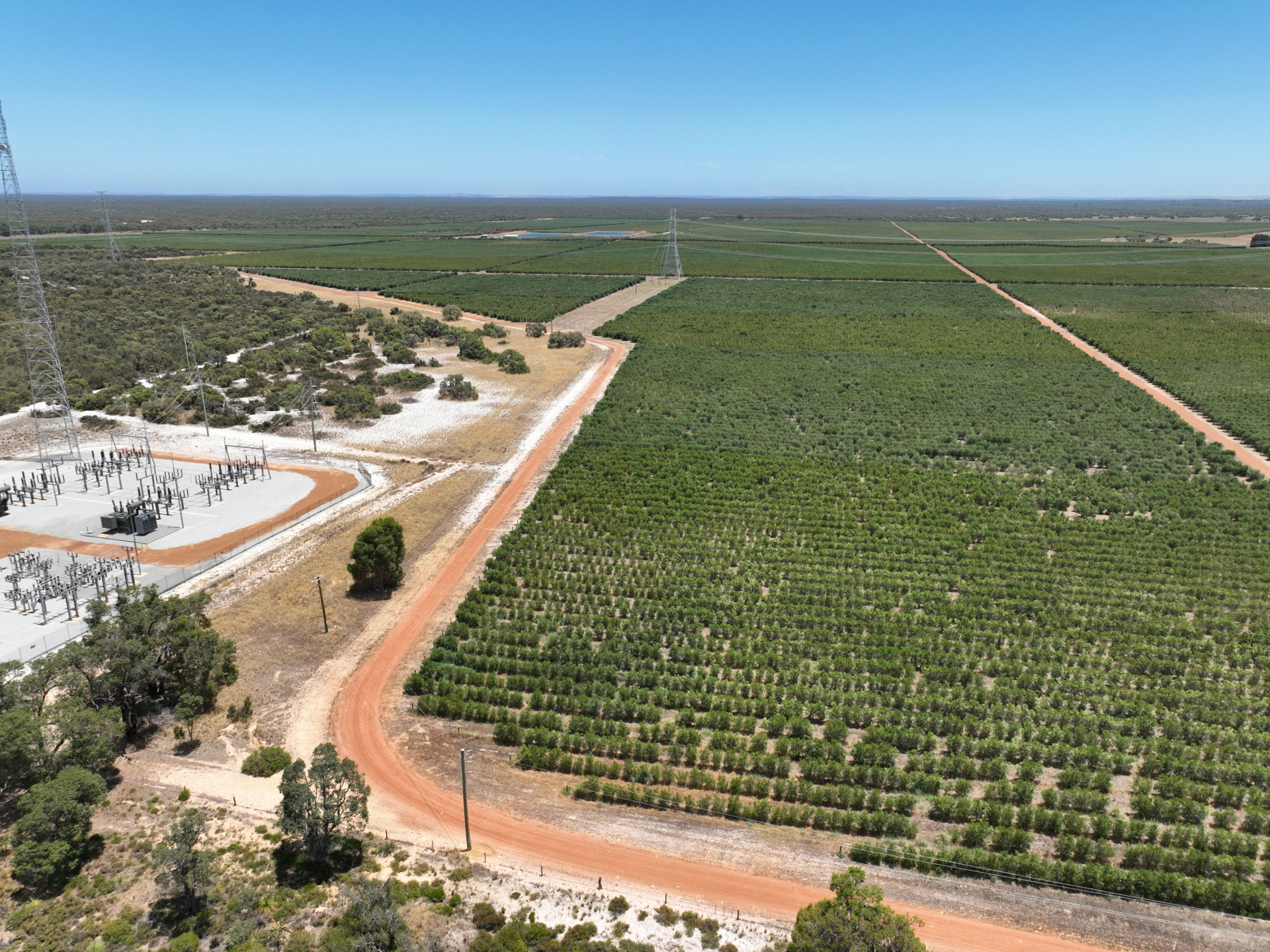 Aerial photo of the Regans substation gravel road and farmland in the background.
