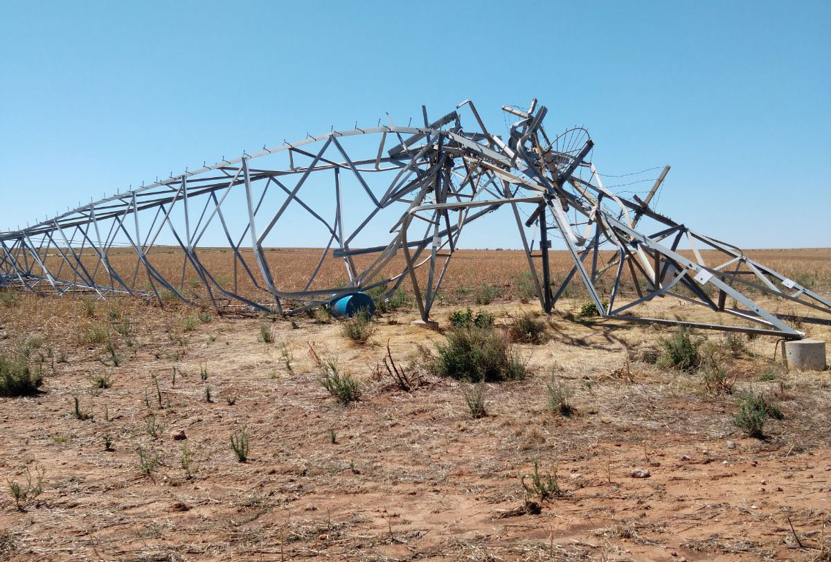 Storm damaged transmission tower