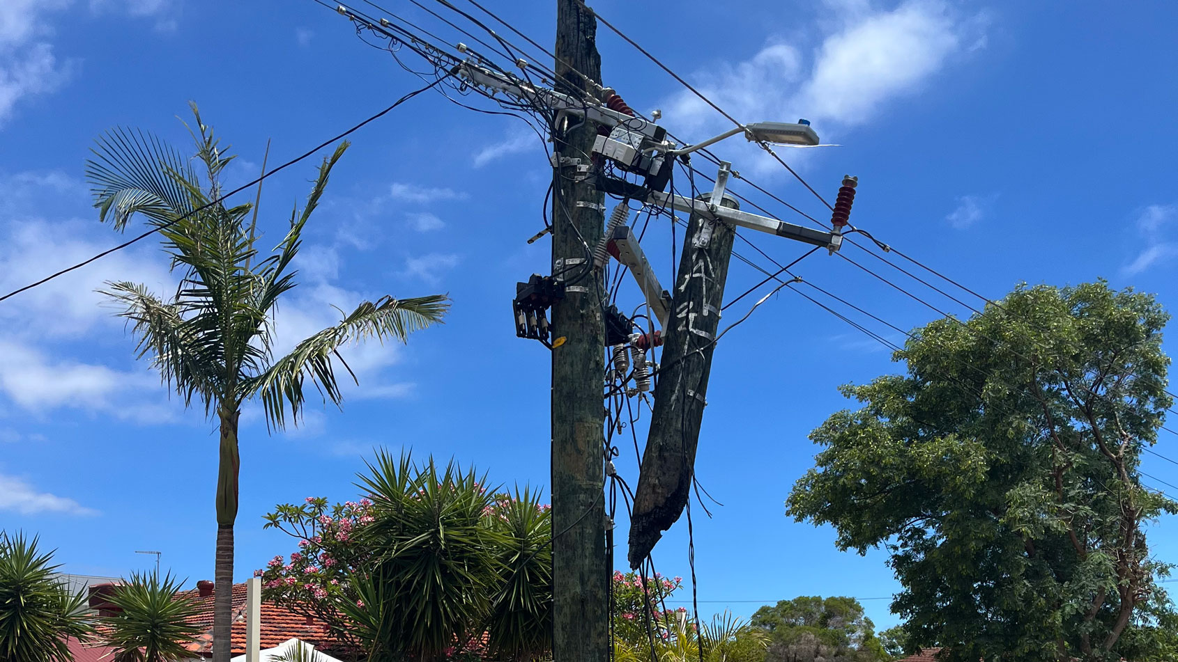 Damaged electricity power pole