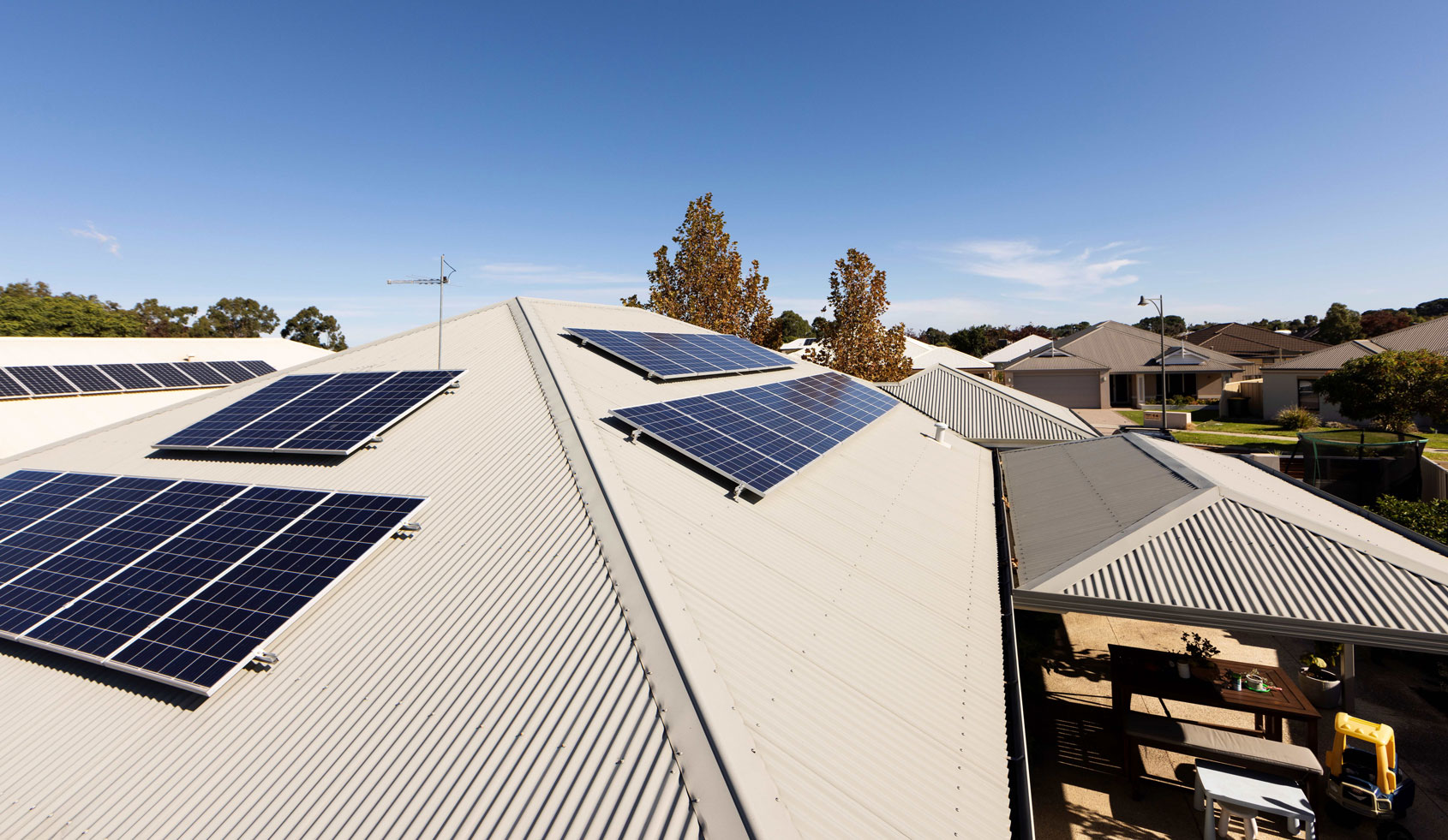 Rooftop solar panels on a suburban house