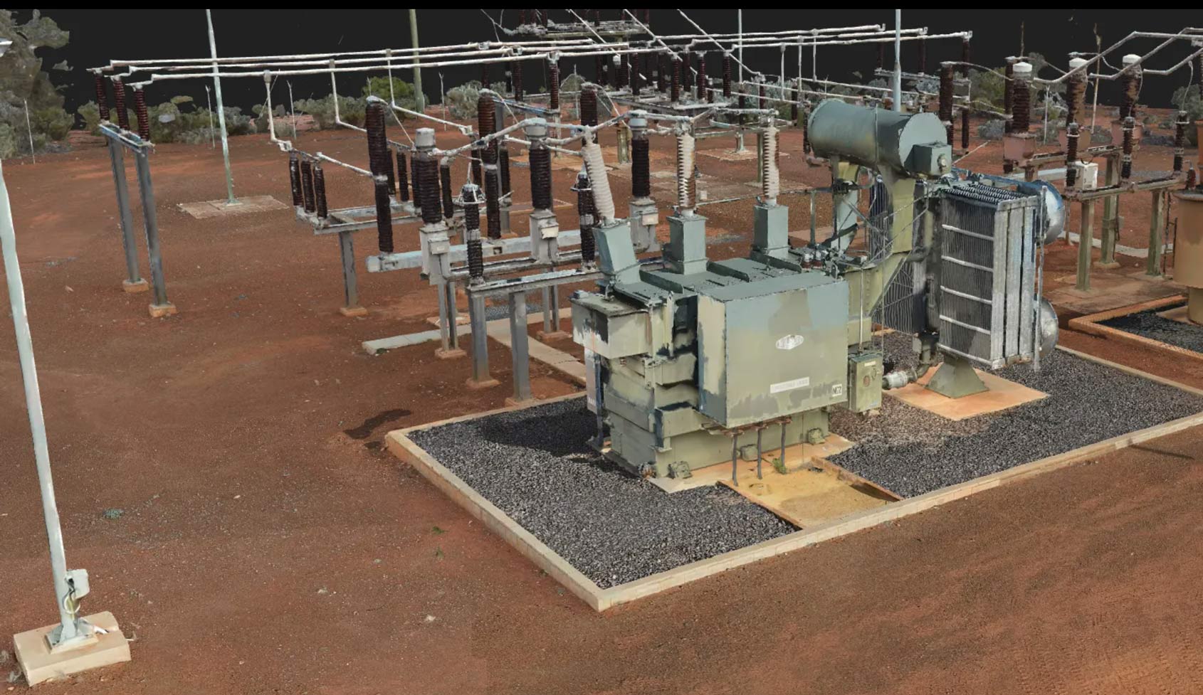 Outdoor electrical transformer and high-voltage substation equipment.