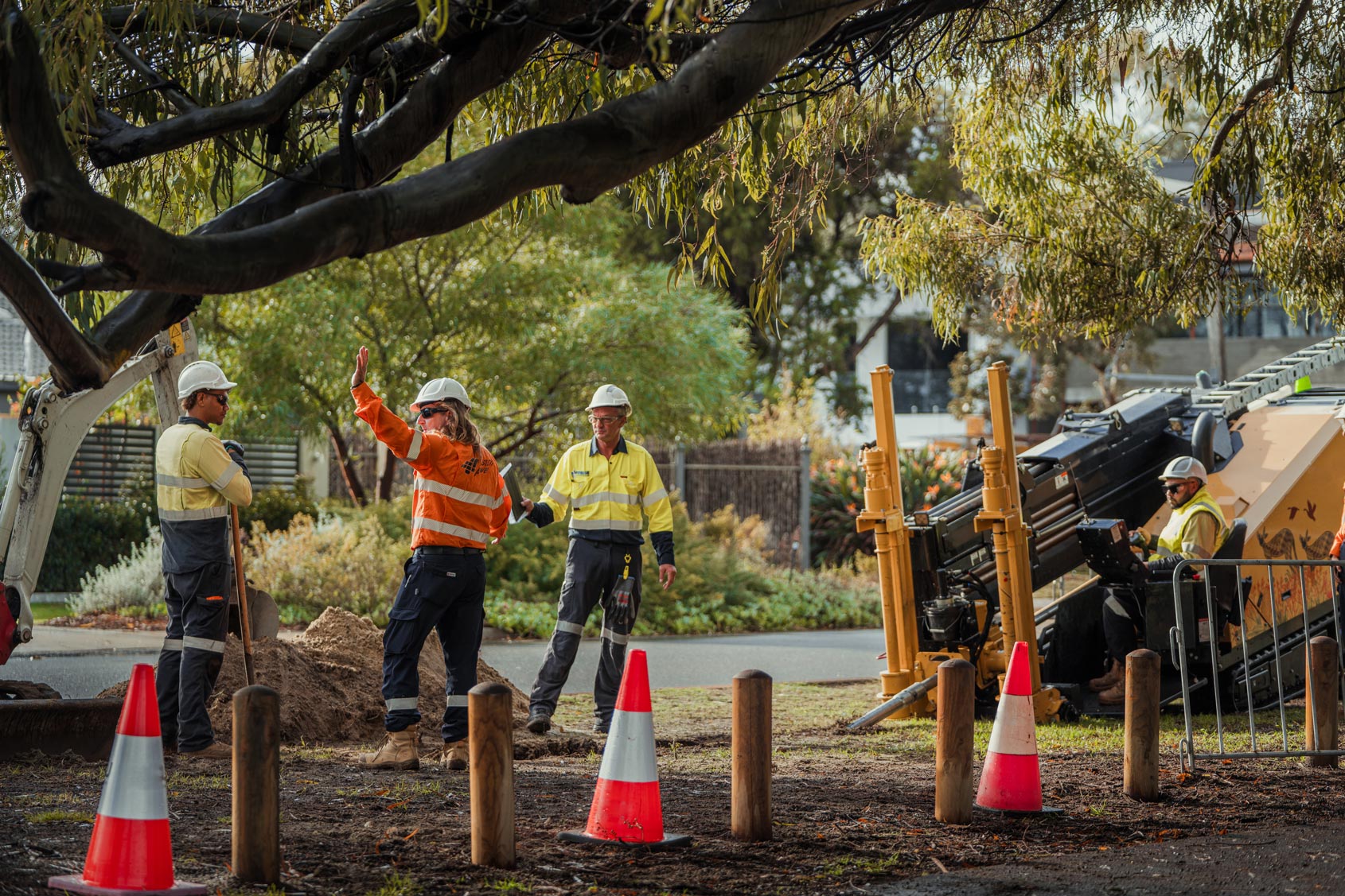 A Western Power crew stood in a residential street at the site of an underground power project