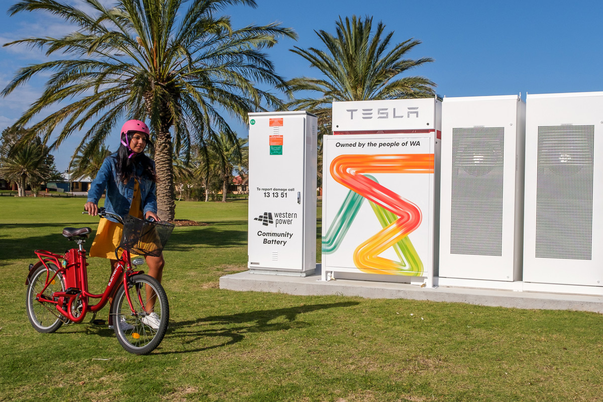 community battery girl on bike perth