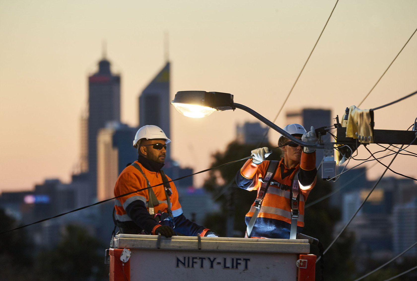 Crew on powerlines at night perth cbd