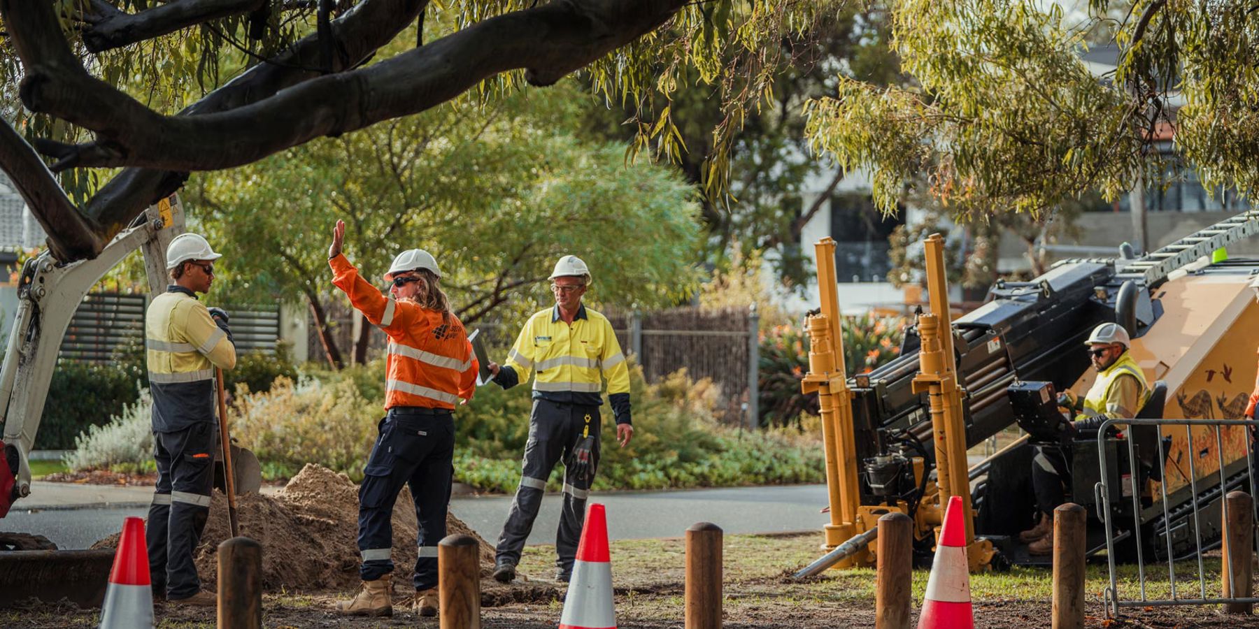 A Western Power crew stood in a residential street at the site of an underground power project