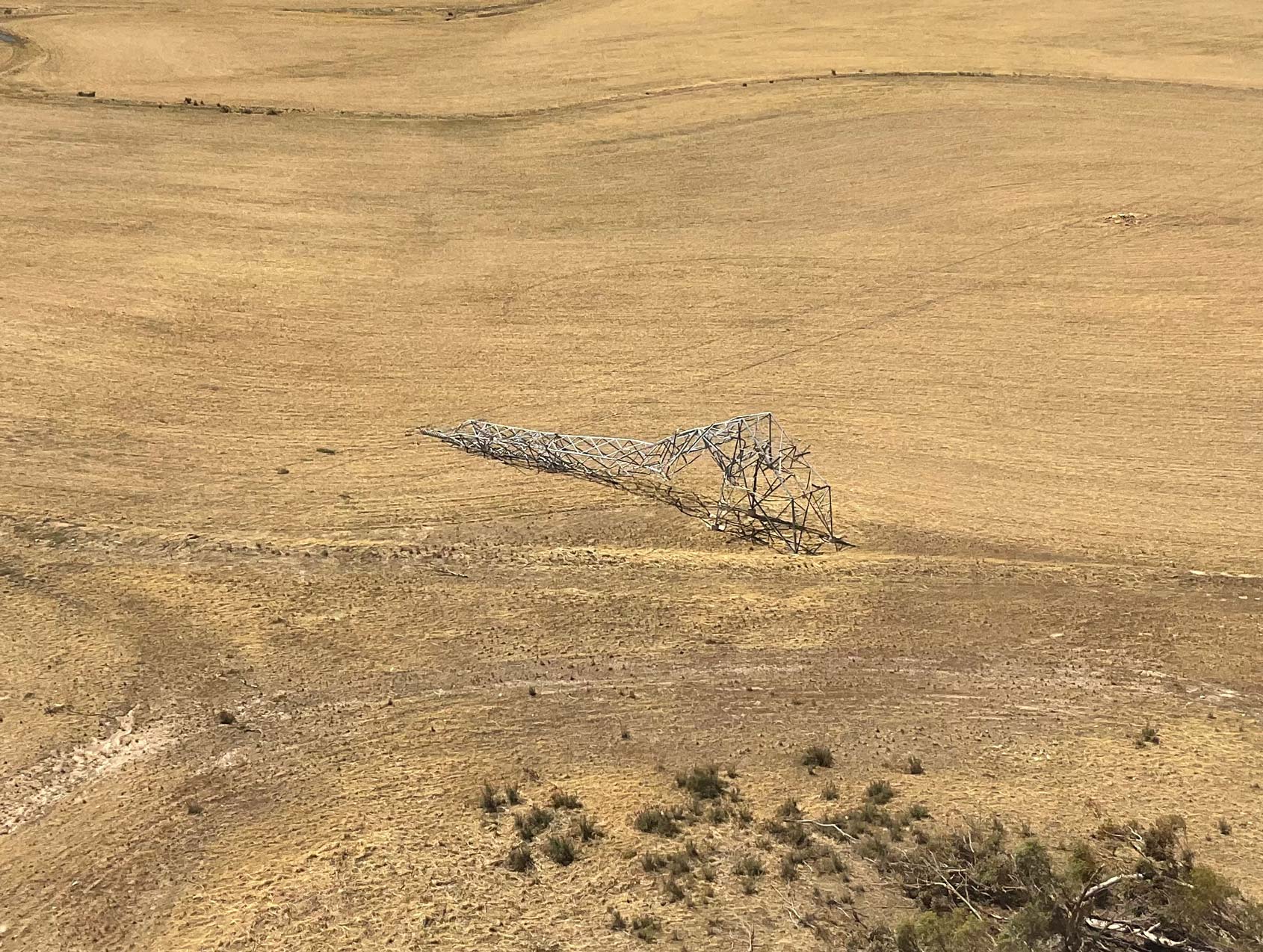 Storm damaged transmission tower